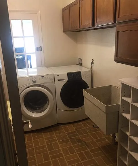 Utility Room, including modern HE washer and Dryer, laundry