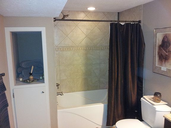 Tiled showers and floors in both bathrooms.