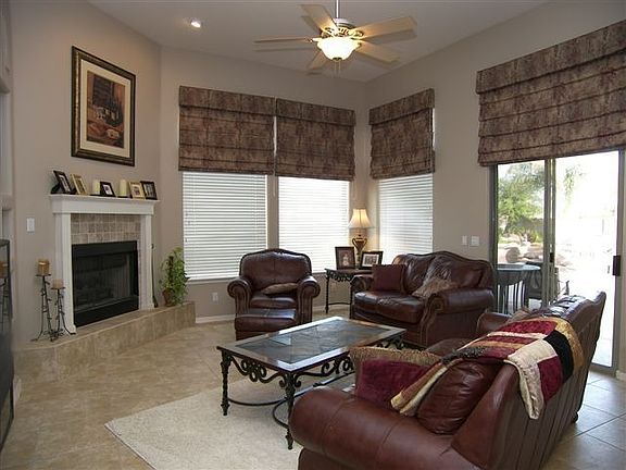Cozy Family Room off Kitchen with lots of windows peering into backyard 