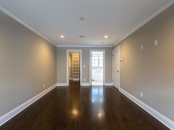 Primary Bedroom with walk in closet and luxury bath