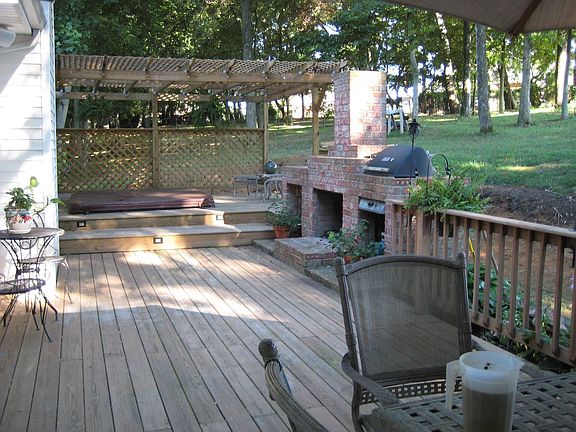 Grill out, enjoy the fireplace from the hot tub!