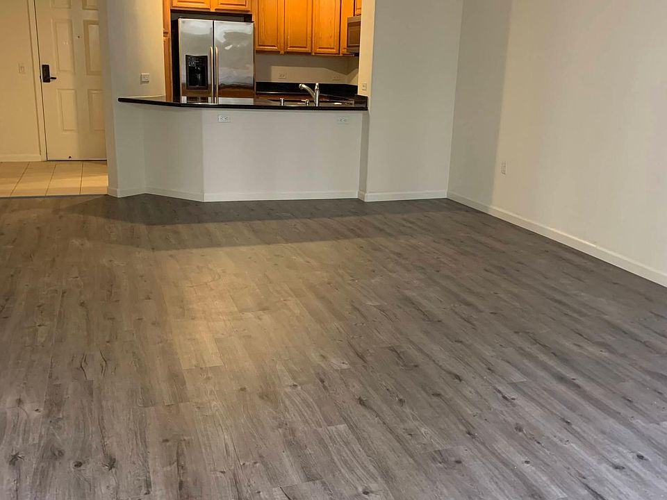 Brand new water-proof hardwood flooring makes the living room modern and spacious.