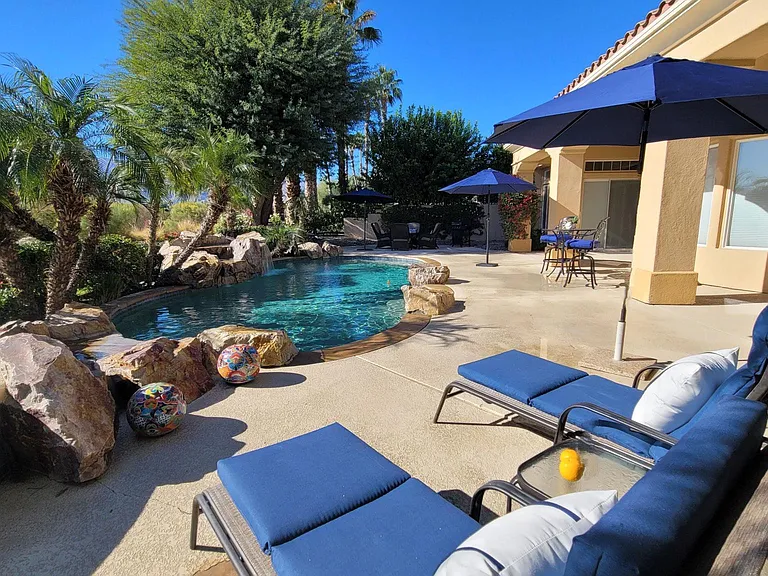 Relaxing poolside with beautiful views.