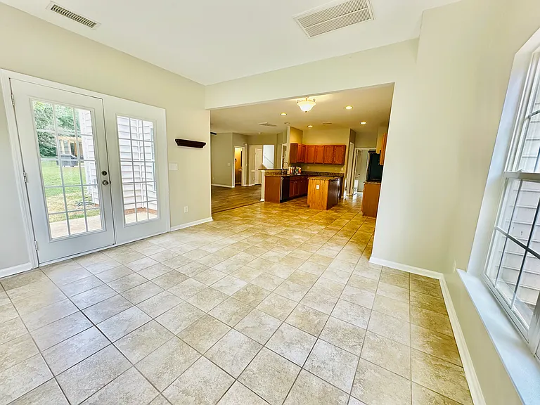Sunroom space open to accessible kitchen