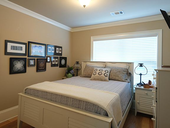 Guest room with french doors walk in closet