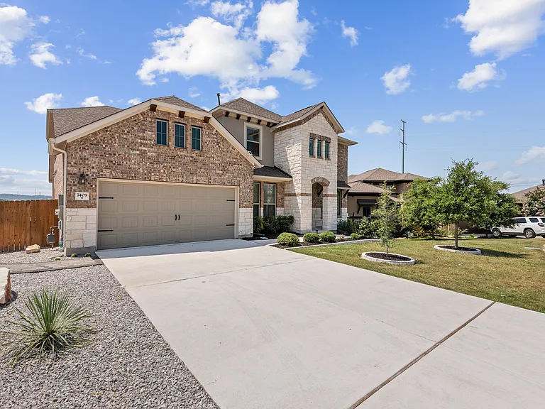 7409 Turnback Ledge Trl — Photo 35
