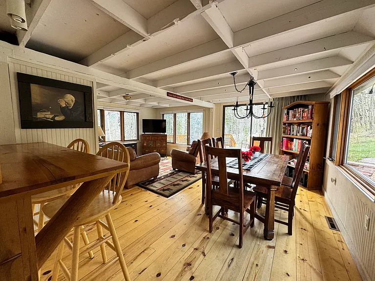 Dining area, sunroom, kitchen bar seating
