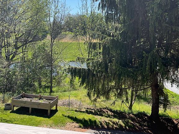 Deck overlooks a duck pond. Private setting.