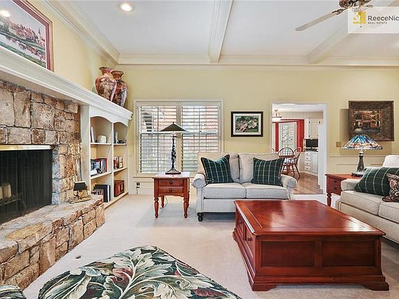 Beautiful trim including beams, crown molding and built ins