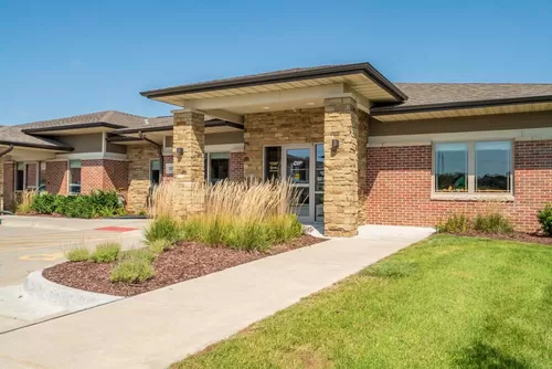 Our leasing office is at the entrance of our community, where our friendly staff is available to answer any questions. - Villas of Omaha at Butler Ridge