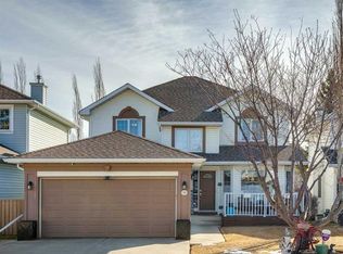 420 W Rocky Ridge Bay NW, Calgary, AB T3G4H8