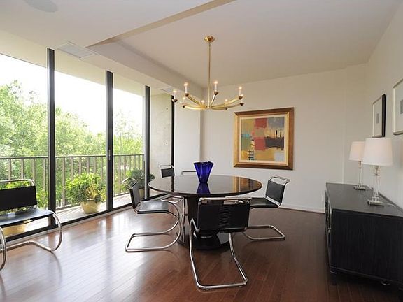 Separate formal dining room with plenty of space for a large table and big furniture. One of 3 balco