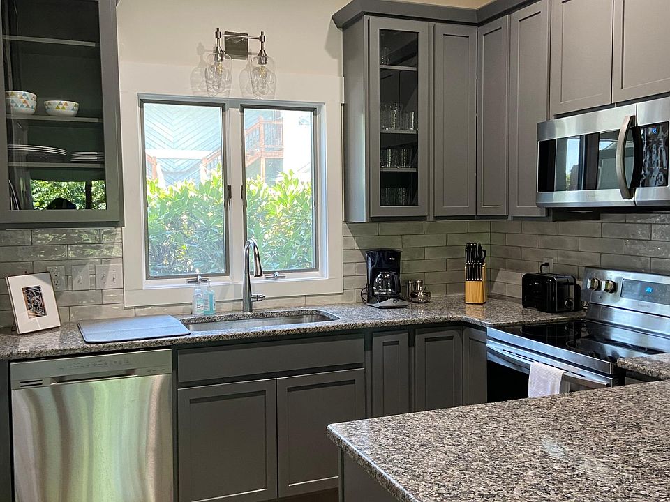 Brand new kitchen with granite counters, plenty of cabinet space and all new stainless appliances.