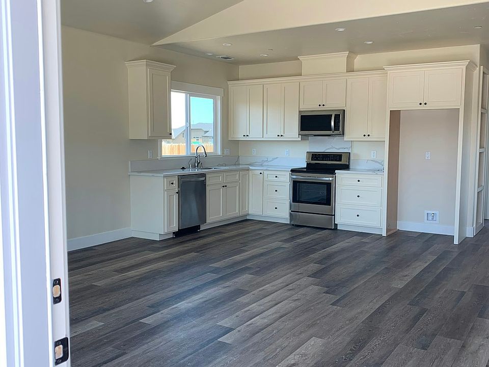 Photo shown without refrigerator. Fridge is included.