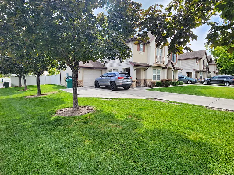 Corner lot is large and only has one adjacent neighbor. Check out large grassy area and driveway with extra car pad!