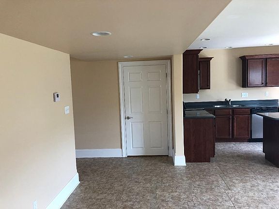 Open floor plan kitchen, dining & living room