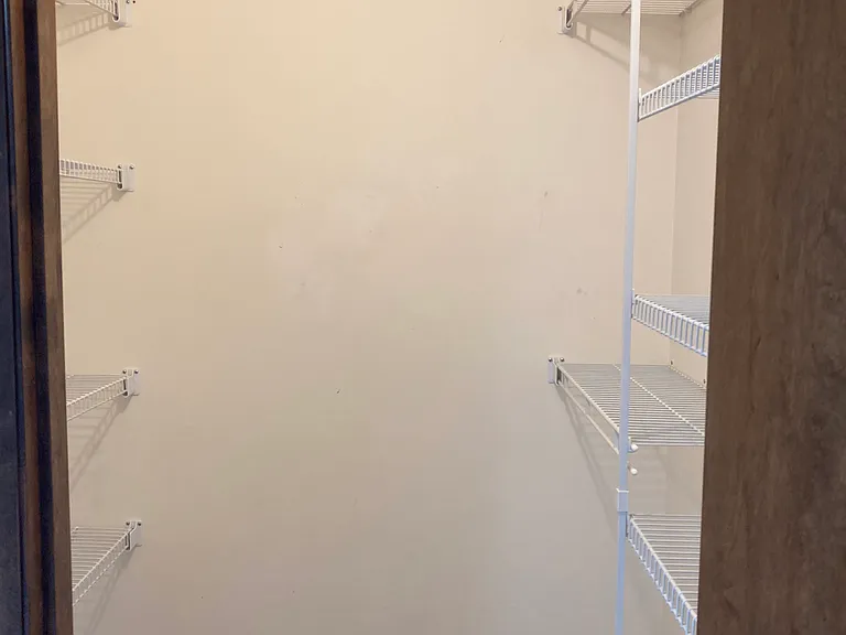 Upstairs Bedroom walk-in closet.