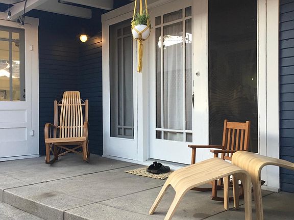 Side yard with beautiful fruit trees and some grass
