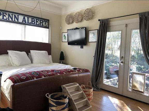 Master bedroom with French doors to backyard 