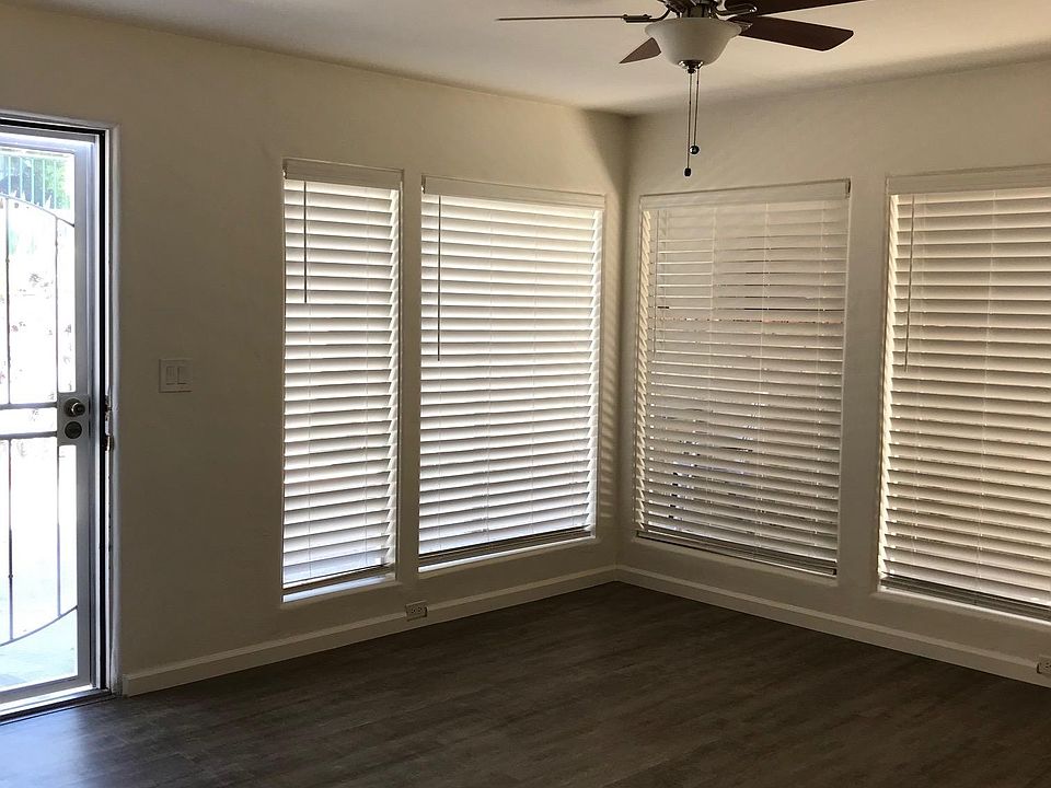 Living room with entry door.