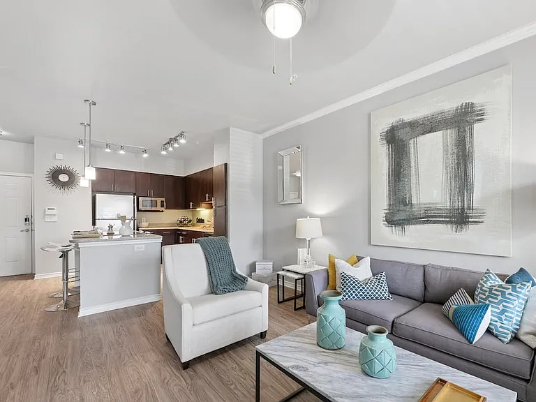 Kitchen and living room with hard surface flooring