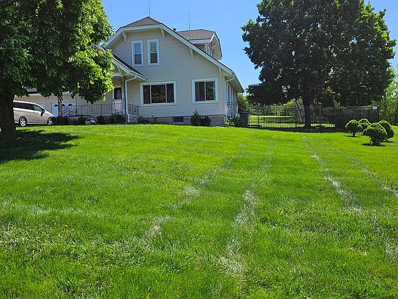 Front yard with mature trees for shade
