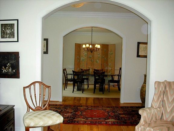 Living Room looking to Hall and Formal Dining Room