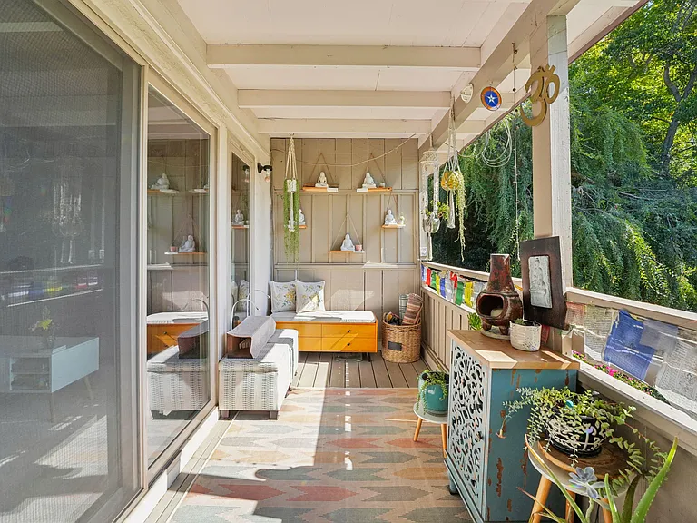 Private covered deck with views of nature. Many residents extend their living area out into the decks and patios.