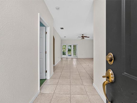 4th image of 7011 N PLUM TREE