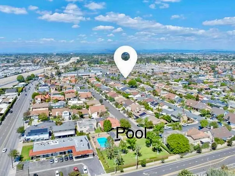 Aerial of Neighborhood with view to Community Pool