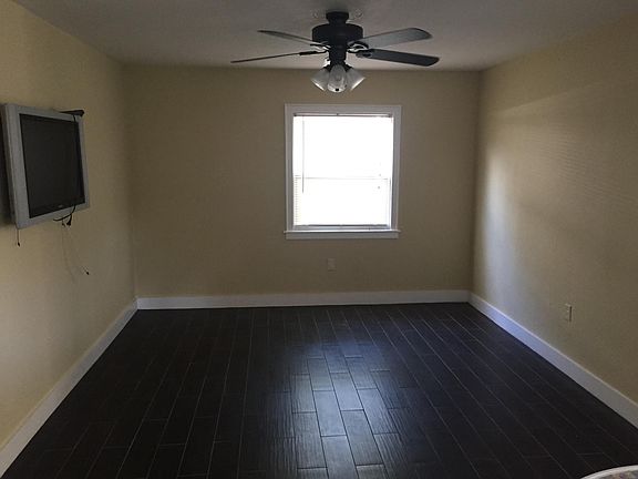 Living room viewed from the breakfast bar. Room is about 11ft wide.