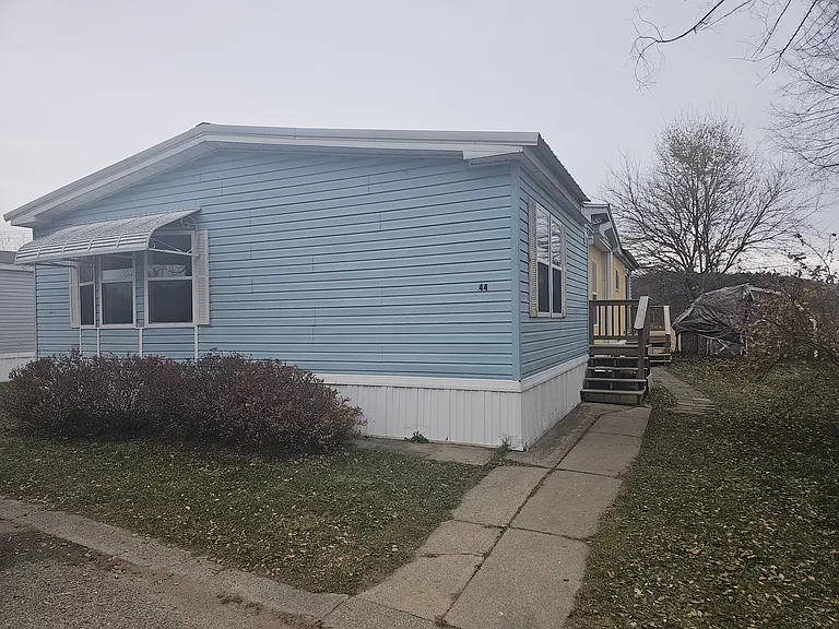 Exterior walkway to front door.