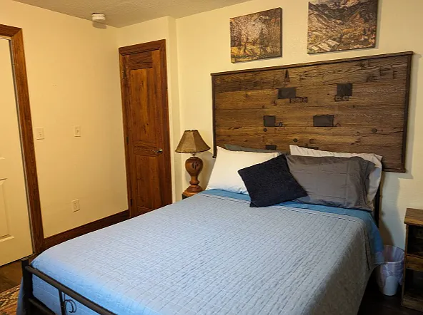 "Colorado" private bedroom in garden level basement