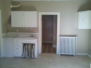 Kitchen looking into bath