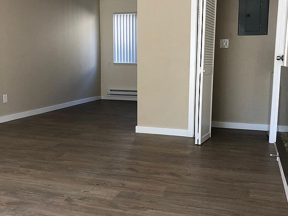 Same view/ different day and angle. The wood flooring is new.