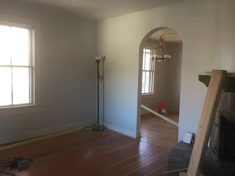 Newly painted living room with gas fireplace.