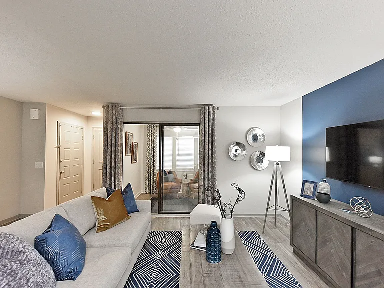 Spacious living room with hardwood-style flooring