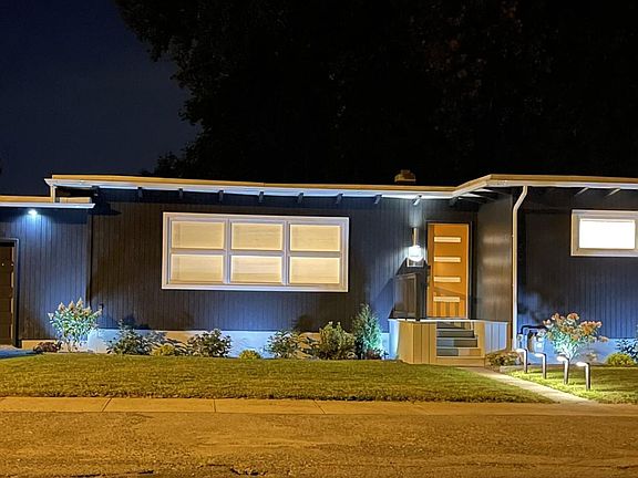A street view of the home. The driveway has room for two vehicles.