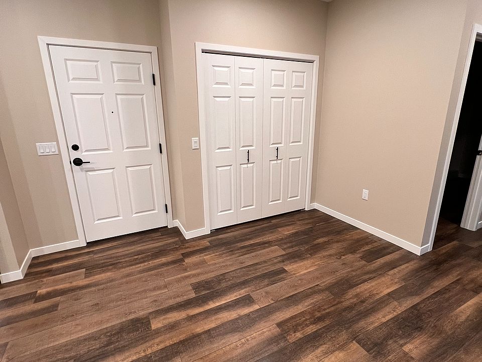 Dining room, storage closet, door entry to common area hallway