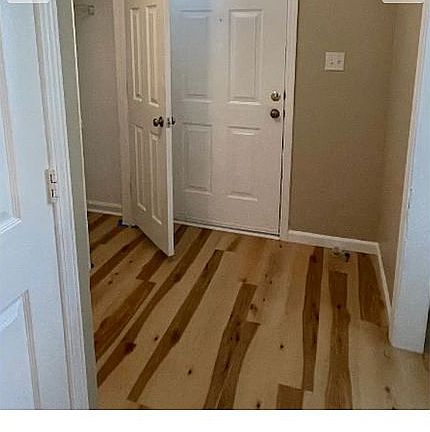 Front door and coat closet 