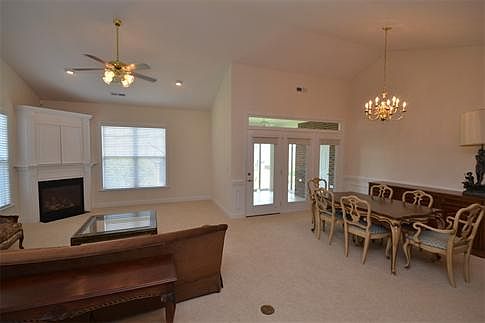 The impressive great room has plenty of room to sprawl out or just snuggle up with by the warm fireplace.