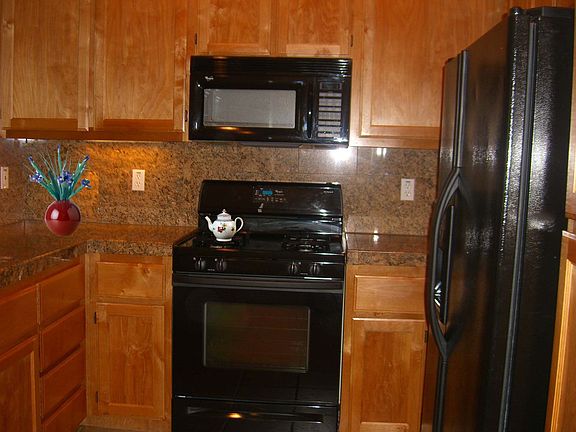 Upgraded kitchen with granite counter