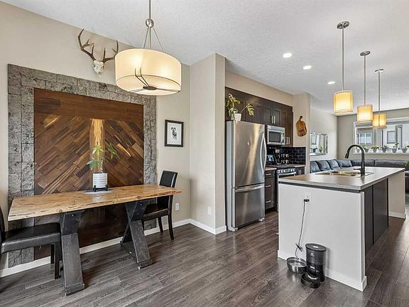 3rd image of 213 Copperpond Vlg SE