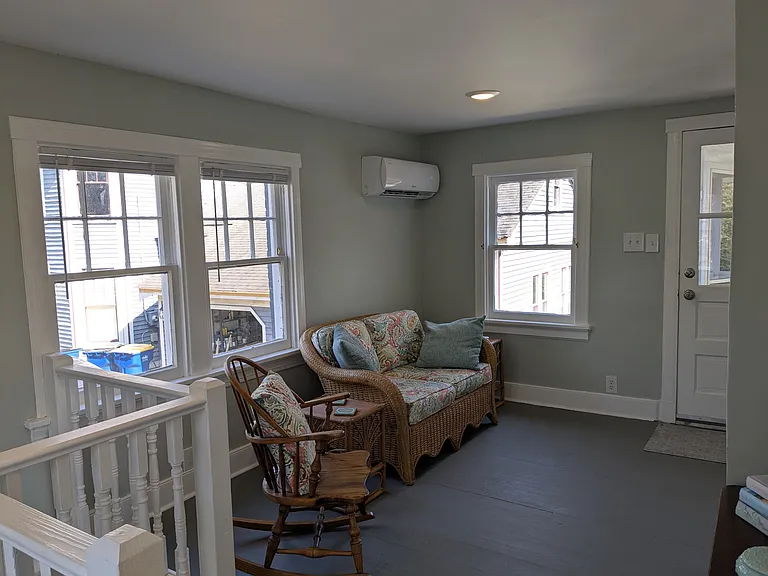 Upstairs living area with exit to screened porch.