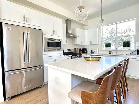 2nd floor kitchen and island (seats 4)