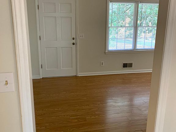 Front door and living room, view from keeping room.