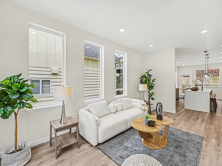 main living area filled with natural light complete with beautiful designer finishes.