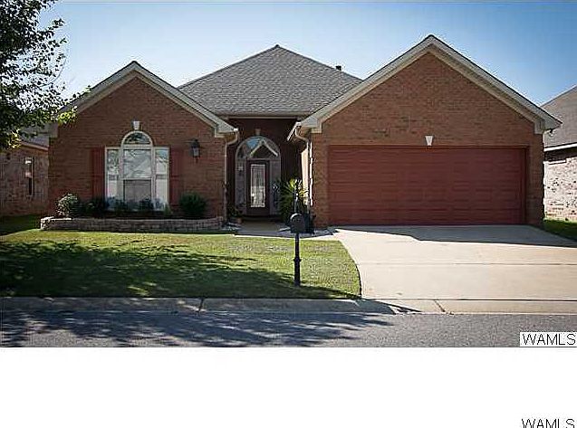 Great curb appeal on this beautifully landscaped home.