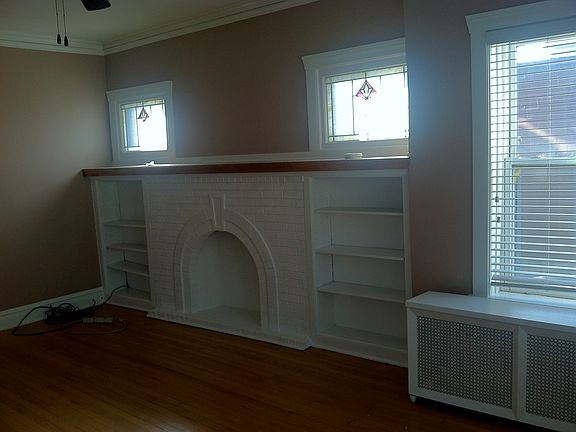 Formal Living Room w/ Built in Bookcases and Fireplace