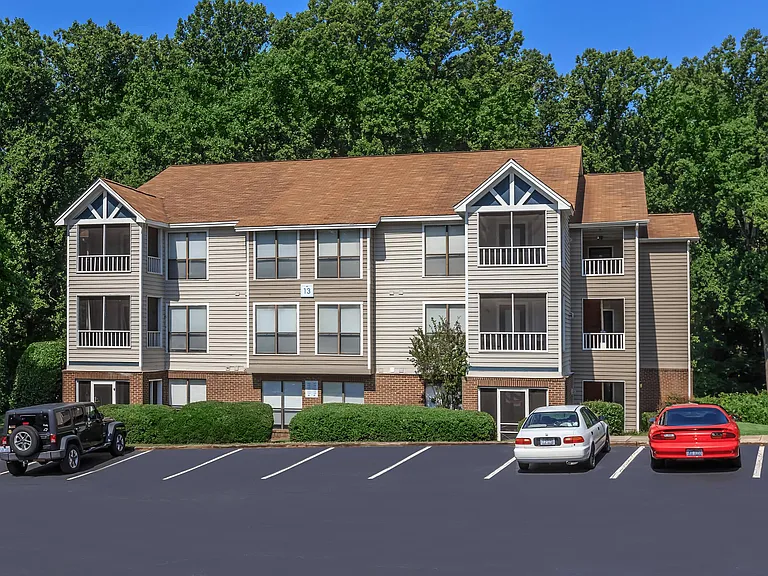 Beautifully Maintained Apartment Building with Reserved Parking Spaces Out Front